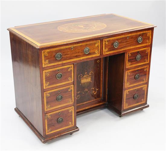 A George III mahogany and marquetry inlaid kneehole desk, W.3ft 4in.